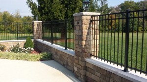 retaining wall with iron fence