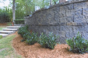 brick retaining wall with landscaping                  