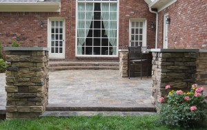 Patio with stone entrance       