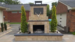 fireplace with mantel and tv